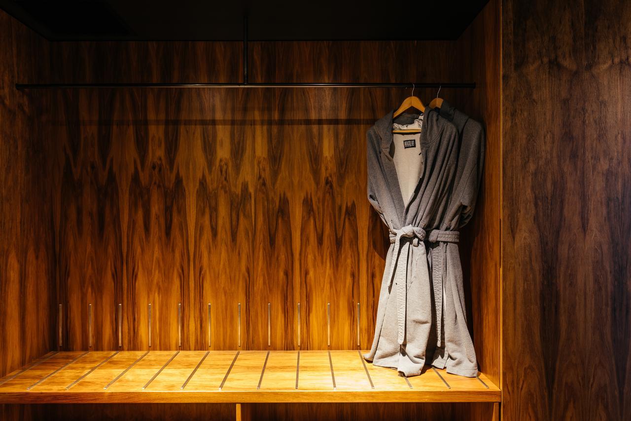 Macq 01 Hotel Hobart Exterior photo A bathrobe hanging on a wooden bench